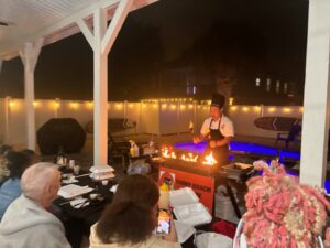 Family enjoying hibachi at home catering in Panama City Beach